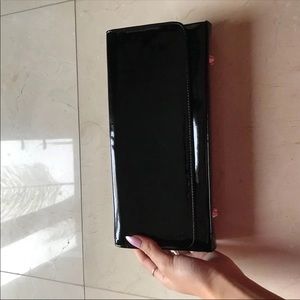 Black patent leather clutch